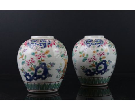 Pair of Chinese Porcelain Bulbous Vases with enamel floral decoration, 14cms high 