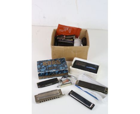 A mixed collection of Harmonicas to include Hohner examples together with a Jews Harp. 