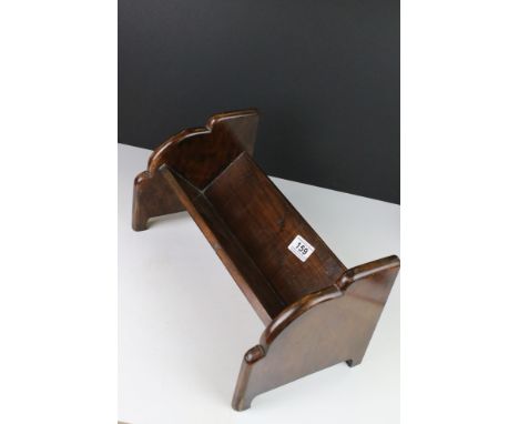 Art Deco Wooden Book Trough with cloud style carved ends, 38cms long 
