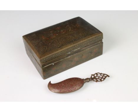 An asian brass decorative cigarette box together with a scent bottle of similar design. 