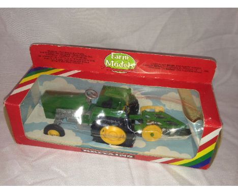 BRITAINS - TRACTOR AND PLOUGH (9435)