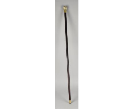 A Reproduction Walking Stick with Faux Bone Finial in the Form of a Globe with Hinged Top To Sundial and Compass