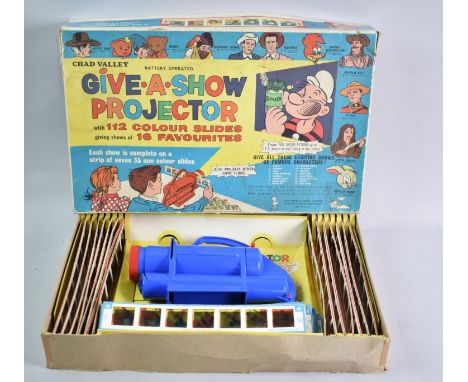 A Vintage Chad Valley Give-A-Show Projector with Extra Slides