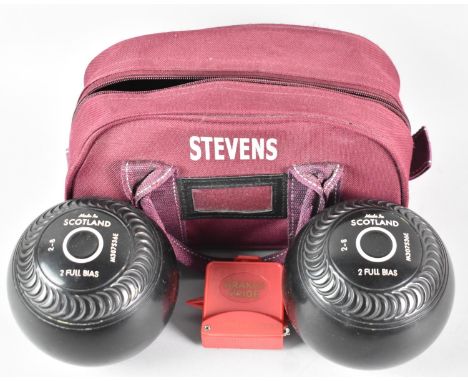 A Pair of Modern Taylor Grippa 2 Full Bias Lawn Bowls in Canvas Bag with Measuring Tape