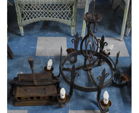 A Mid 20th century Wrought Iron Gothic Style Six Branch Ceiling Chandelier (70cm High) together with a Press by The Adhesive 