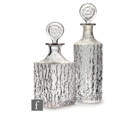 Two mid 20th Century Whitefriars Glacier range decanters, designed by Geoffrey Baxter, the first of sleeve form, the other of