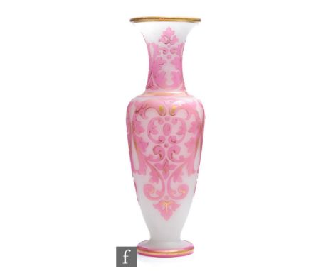 A mid 19th Century Baccarat Cameo glass vase of slender shouldered ovoid form with flared collar neck and circular spread foo