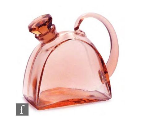 A Czechoslovakian glass decanter, circa 1930s, formed as a teapot with applied loop handle with faceted stopper, all in a pin