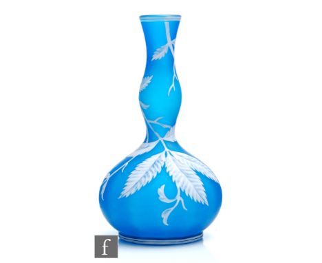 A large late 19th Century Cameo glass vase, possibly Stevens &amp; Williams, of double gourd form, cased in opal over blue an