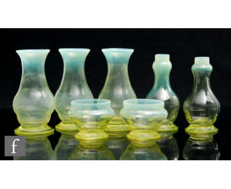 A small collection of 1930s Gray-Stan straw opal glass items, to include three vases of footed swollen and flared form, a pai