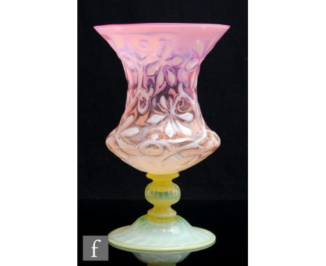 A late 19th Century John Walsh Walsh glass vase of waisted form, relief moulded in the Chestnut pattern with opalescence over