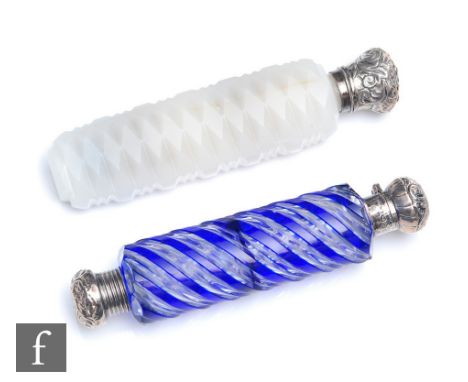 A 19th Century double-ended scent bottle, clear crystal cased in blue, flash cut in a spiral banded design, adorned with silv