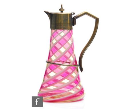 A 19th Century British glass jug of conical form, decorated in the Cleveland pattern with alternating green pink and opal int