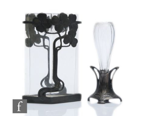 Two early 20th Century Art Nouveau pewter posy vases, the first of diamond form within a pewter mount with four leaf clovers,