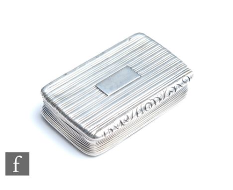A Georgian hallmarked silver cushioned rectangular snuff box with reeded decoration and foliate detailed thumb rest, length 6
