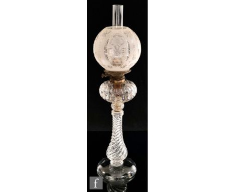 A mid 19th Century Stourbridge clear crystal oil lamp, with an acid etched clear crystal lamp shade, mounted with a Hinks &am