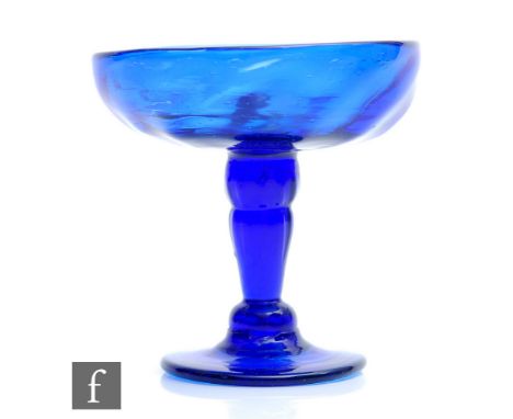 An 18th Century Bristol Blue patch stand, circa 1750, the fluted shallow rim bowl with central knop above a fluted double bal