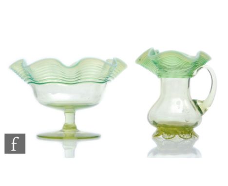 A late 19th Century composed Stourbridge glass strawberry set, each with threading rim over a graduated opal ground. (2) 