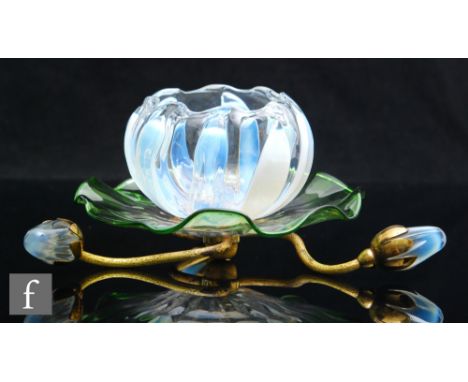 An early 20th Century John Walsh Walsh Water Lily posy holder, the gilt metal stand with three branches terminating in leaves
