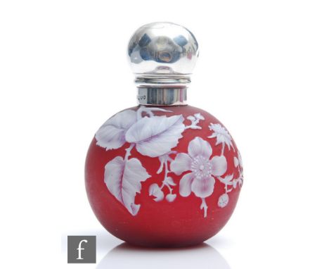 A late 19th Century Thomas Webb &amp; Sons Cameo glass scent bottle of spherical form, cased in opal over ruby and cut back w