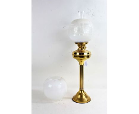 Victorian brass oil lamp, with fluted column, including two opaque white glass shades, one with applied decoration, 48cm high
