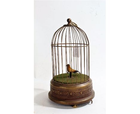 20th century singing bird automaton, housed in a brass bird cage, 28cm high