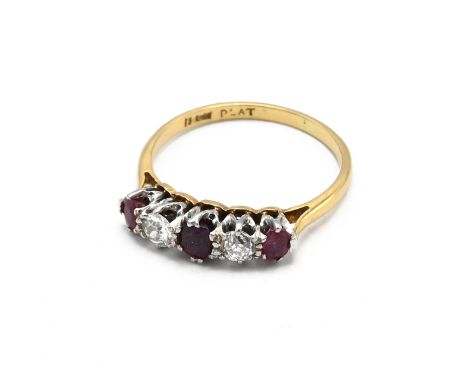 An 18ct gold five stone ruby and diamond ring, set two diamonds and three rubies, each measureing 0.15 carats, &nbsp;finger s