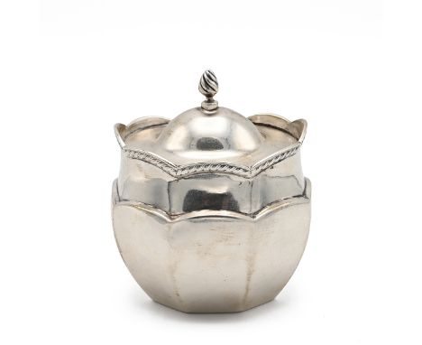 An Edwardian silver tea caddy, of oval form with a hinged top and flame finial, Birmingham 1903, maker's marks worn, 10cm hig