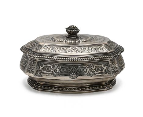 A 20th century continental tureen and cover, of shaped outline and with a flower bud finial, repeating motifs throughout, the