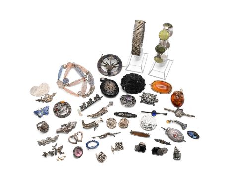 A collection of Victorian and later jewellery, including Scottish silver, enamel and hardstone brooches, aesthetic movement b