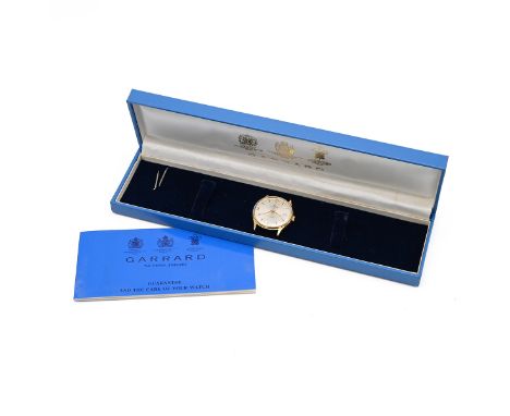 Garrard gold Automatic watch. 35mm case with brushed steel dial. Boxed and guarantee card. Strap not present. (s)&nbsp;