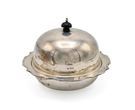 A George V silver muffin dish, with a detachable liner and cover, having a turned ebony finial, Sheffield 1913, James Dixon &