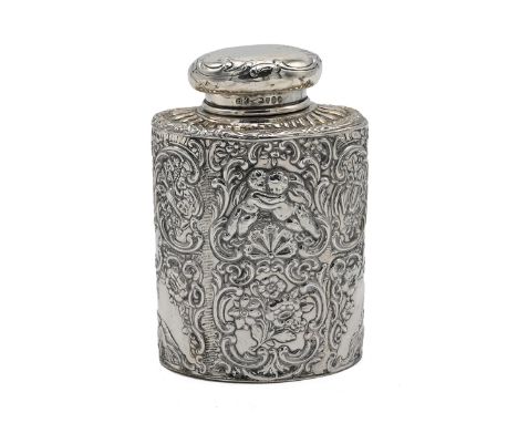 A Dutch imported silver caddy, decorated in relief with embracing cherubs, musical instruments and various foliage. Import ma