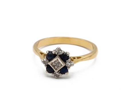 A yellow gold diamond and sapphire cluster ring, ring size M, total gross weight approximately 2.8g, tests as 18ct. (J)