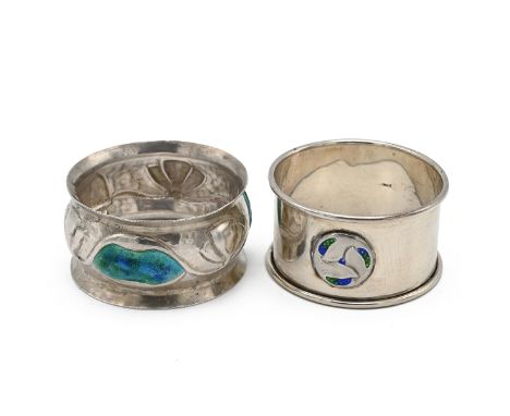 An Arts & Crafts silver and enamel napkin ring, with a central cabochon of stylised form in green, blue and brown enamel, Wil