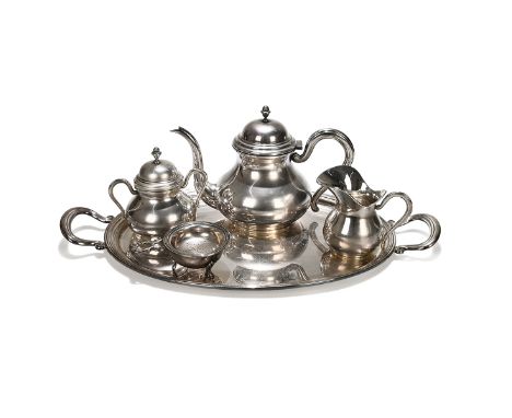 An Elizabeth II silver five piece tea service, comprising teapot, sugar, milk and tea strainer, Birmingham 1999, Victoria Sil