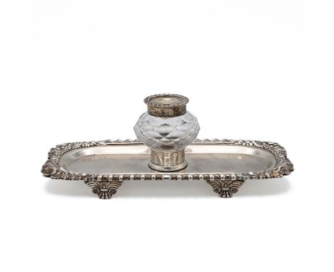 A Victorian silver inkwell, with a gadrooned and foliage border, standing on paw feet, London 1898, makers mark worn, 202 gra