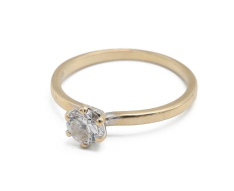 An 18ct yellow gold and diamond solitaire ring, set with a round brilliant cut diamond, approximately 0.45ct, ring size M, to