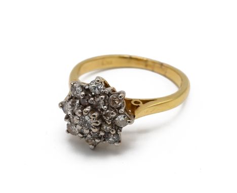 An 18ct yellow gold and diamond cluster ring, ring size K, total gross weight approximately 4g. J