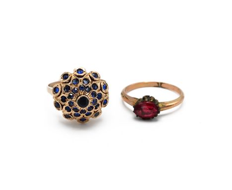 A yellow gold and sapphire bombe cluster ring, size M1/2, total gross weight approximately 7.2g, tests as 14ct gold; together