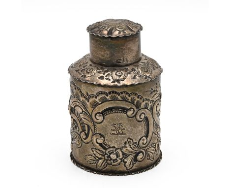 A Victorian silver tea embossed caddy, the cartouche engraved with a lion armorial, Birmingham 1893, Deakin &amp; Francis, 12