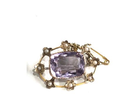 Antique  amethyst and seed-pearl brooch measures approx 3.2cm by 2.4cm 