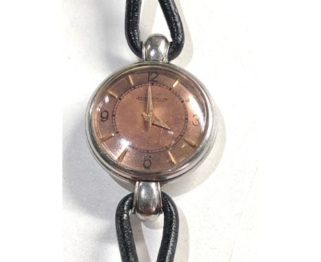 Ladies vintage Jaeger -lecoultre wristwatch back wind watch winds and ticks but no warranty given 