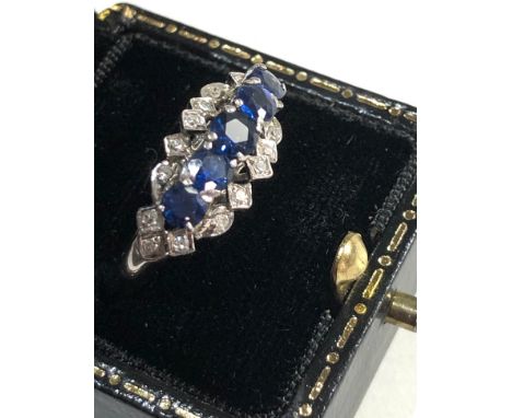 Sapphire and diamond ring marked 14ct weight 3.5g 