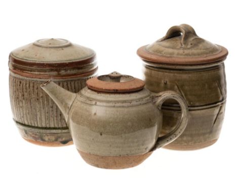 *Richard Batterham (b.1936) two stoneware jars and a teapot:  one of barrel shaped form with vertically ribbed decoration and