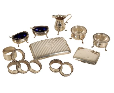 A QUANTITY OF SILVER ITEMS including a small cream jug by Walker and Hall, Sheffield, 1904, together with other similar items