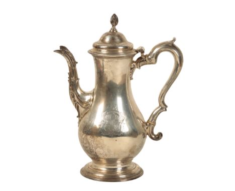 A GEORGE III SILVER COFFEE POT Probably by Charles Wright, London, 1770, with writhern finial, the body of baluster form with