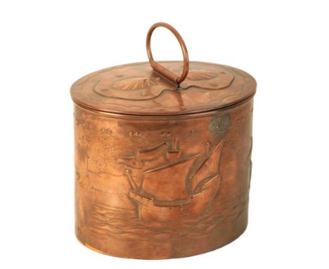 THE COPPER WORKS NEWLYN: AN OVAL TEA CADDY the pull off cover with shell decoration and loop handle, the main body repousse d