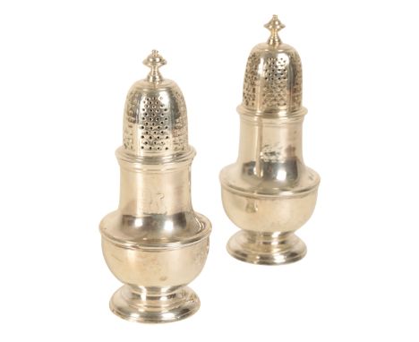 A PAIR OF GEORGE II SILVER SUGAR CASTERS by Samuel Welder, London, 1731, of baluster form, with turned finial, pierced lid, t