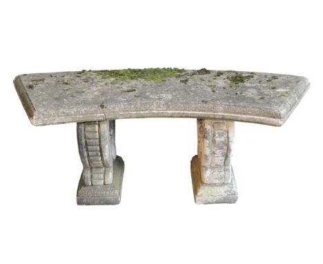 A STONE GARDEN BENCH 20th century, curved with moulded edges, on twin supports, 40cm high x 104cm wide x 45cm deep